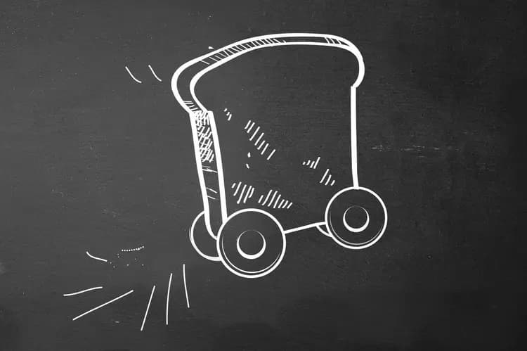 Dessin à la craie blanche d'un camion de livraison sur fond de tableau noir d'ardoise